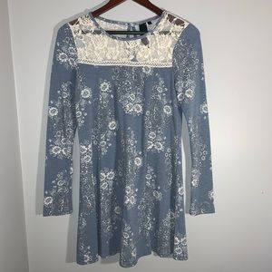 Dusty blue dress with lace shoulders.